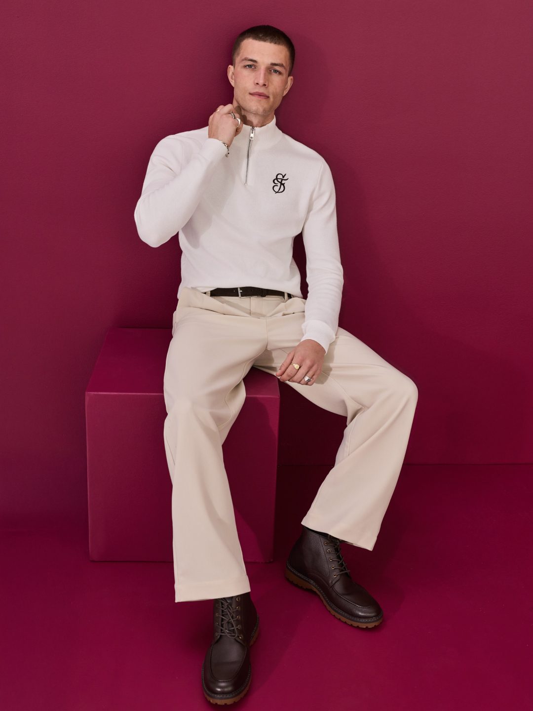 Respectfully, this combo would solve a lot of your problems. Shop any chino & knit for $150